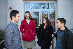 Amanda Kool, (red jacket) clinical instructor at Harvard Law School teaches a clinic to teach students how to provide legal services to people who want to start their own small businesses inside 6 Everett Street in the Wasserstein Hall in the Harvard Law School at Harvard University. She is seen with here HLS students, Matthew Diaz, (from far left) Carolyn Ruiz, and Steven Salcedo. Kris Snibbe/Harvard Staff Photographer