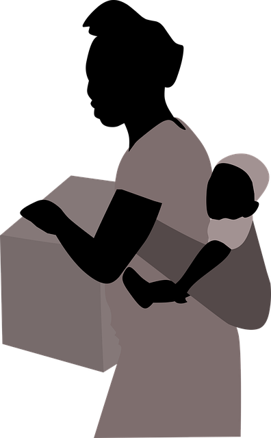 Black and white graphic of a women in a headwrap carrying a child in a sling on her back, holding a box.